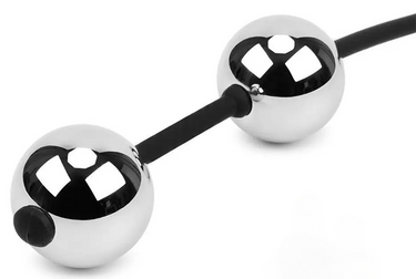 a black and white object is on a white surface